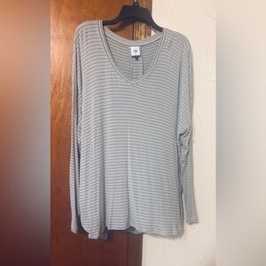 Like new. Worn just a few times.  Cabi long sleeved t shirt.